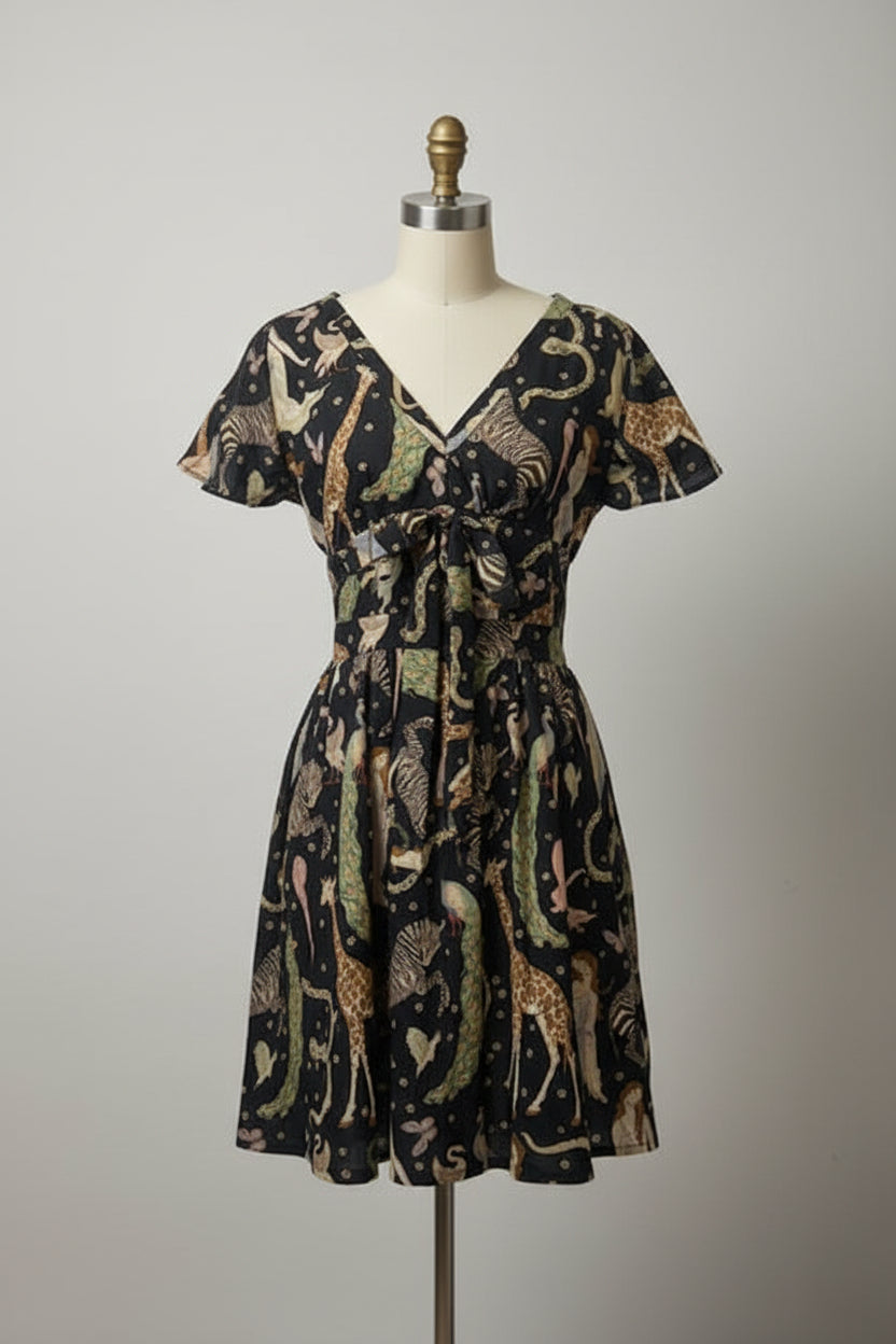 Lightweight cotton unlined dress. Size is Medium.  Machine wash delicate, hang to dry.