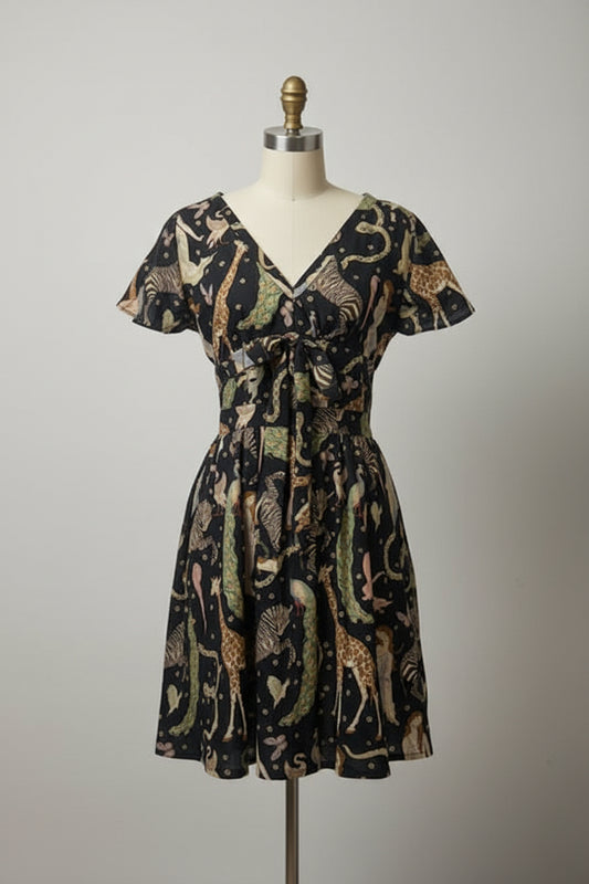 Lightweight cotton unlined dress. Size is Medium.  Machine wash delicate, hang to dry.